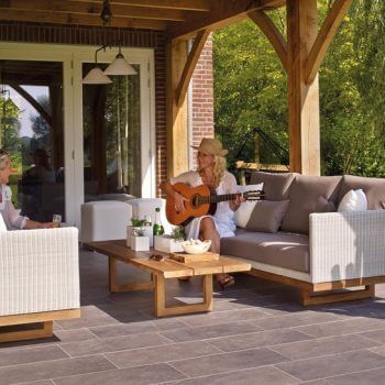 two people on their patio outside in front of their patio door