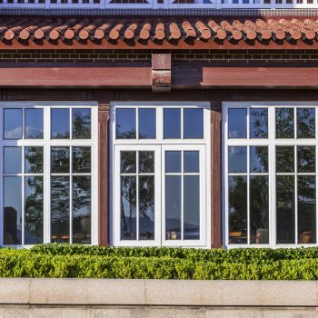 casement windows in a brick house