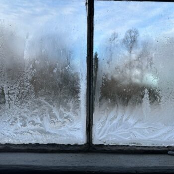 Close up of window panes with frost on them